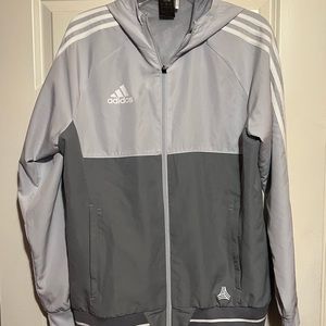 NWOT Adidas Men’s Medium light wait hooded zip jacket.